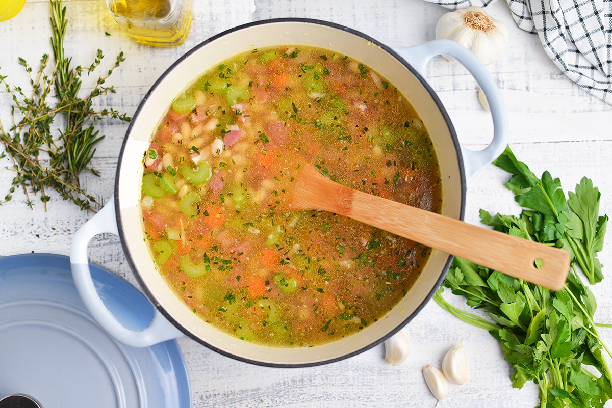 white bean soup in a dutch oven