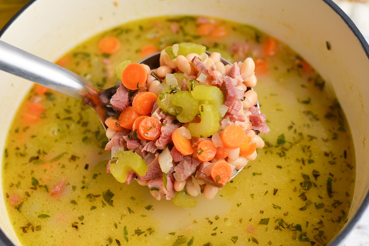 ladle of navy bean soup