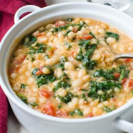 bowl of braised kale with white beans