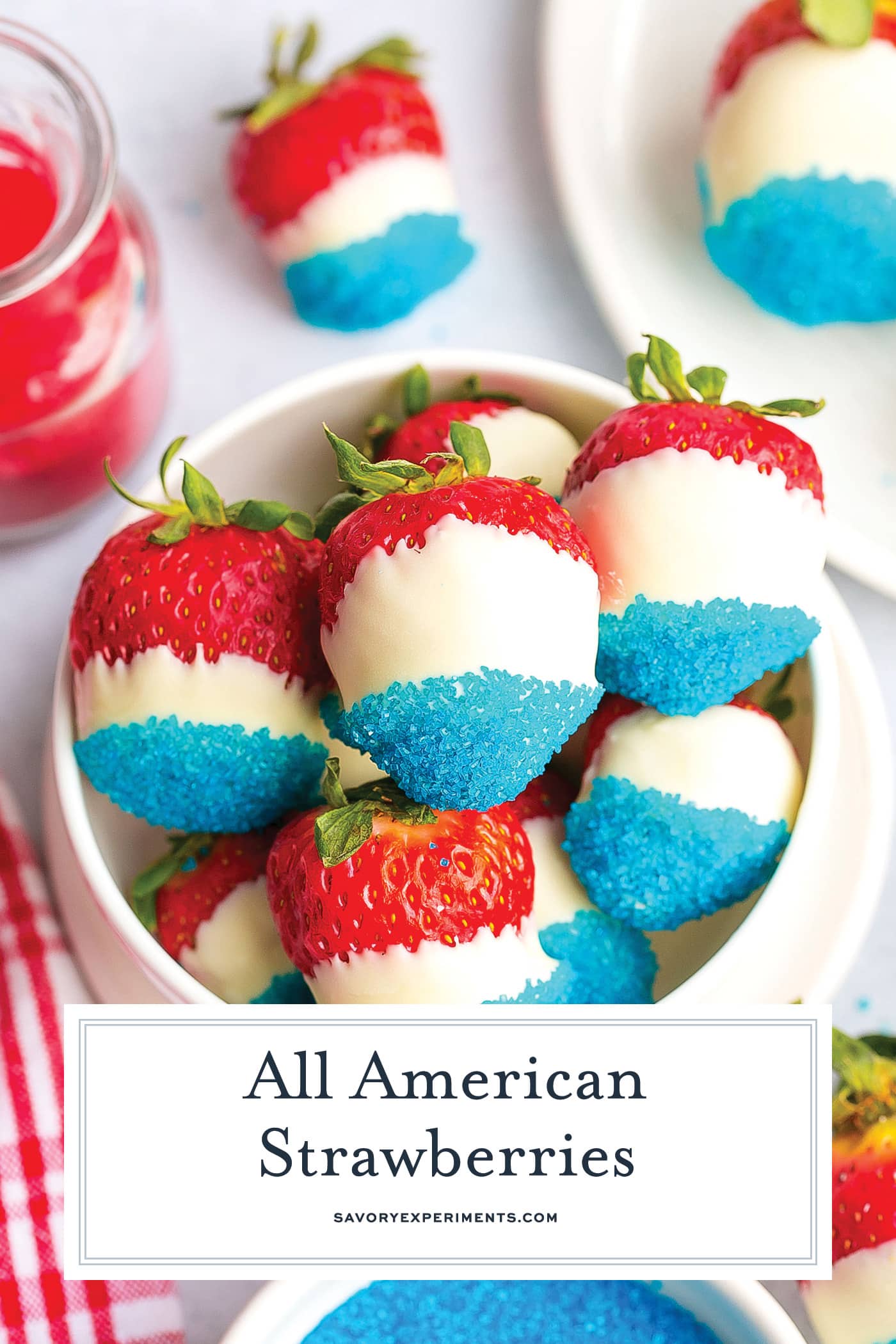 bowl of red white and blue strawberries with text overlay for pinterest