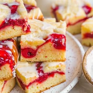 close up stack of cherry pie bars