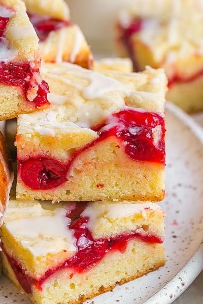 close up stack of cherry pie bars