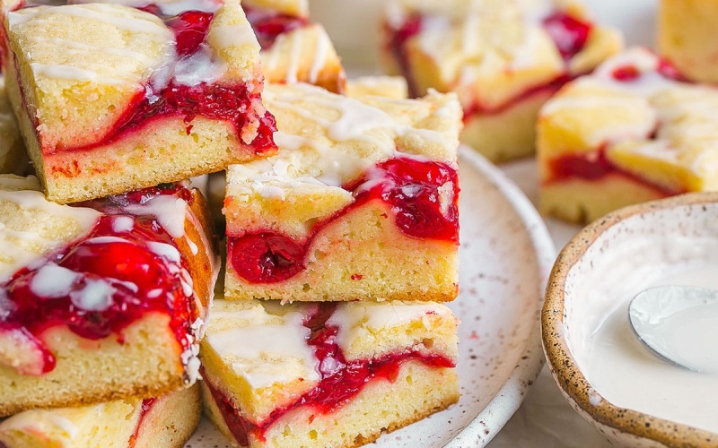 close up stack of cherry pie bars