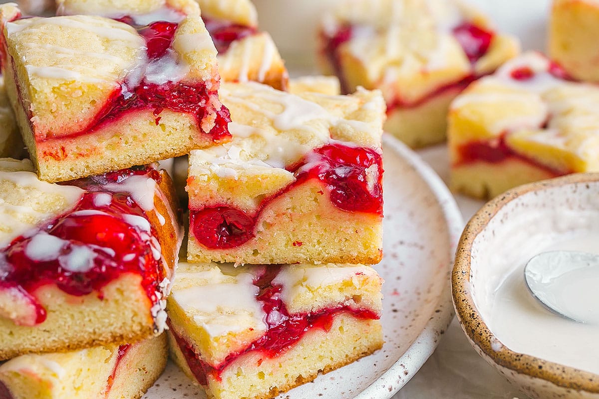 close up stack of cherry pie bars