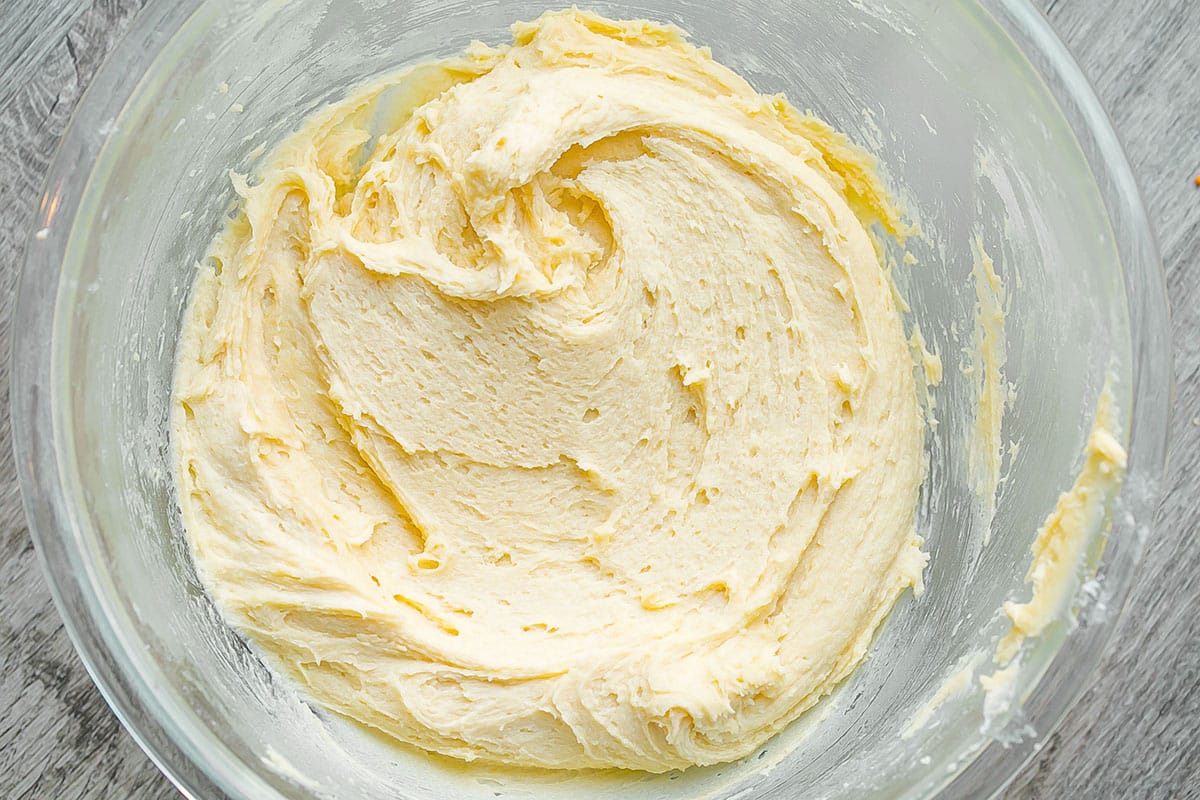 base batter for cherry pie bars in a large glass mixing bowl