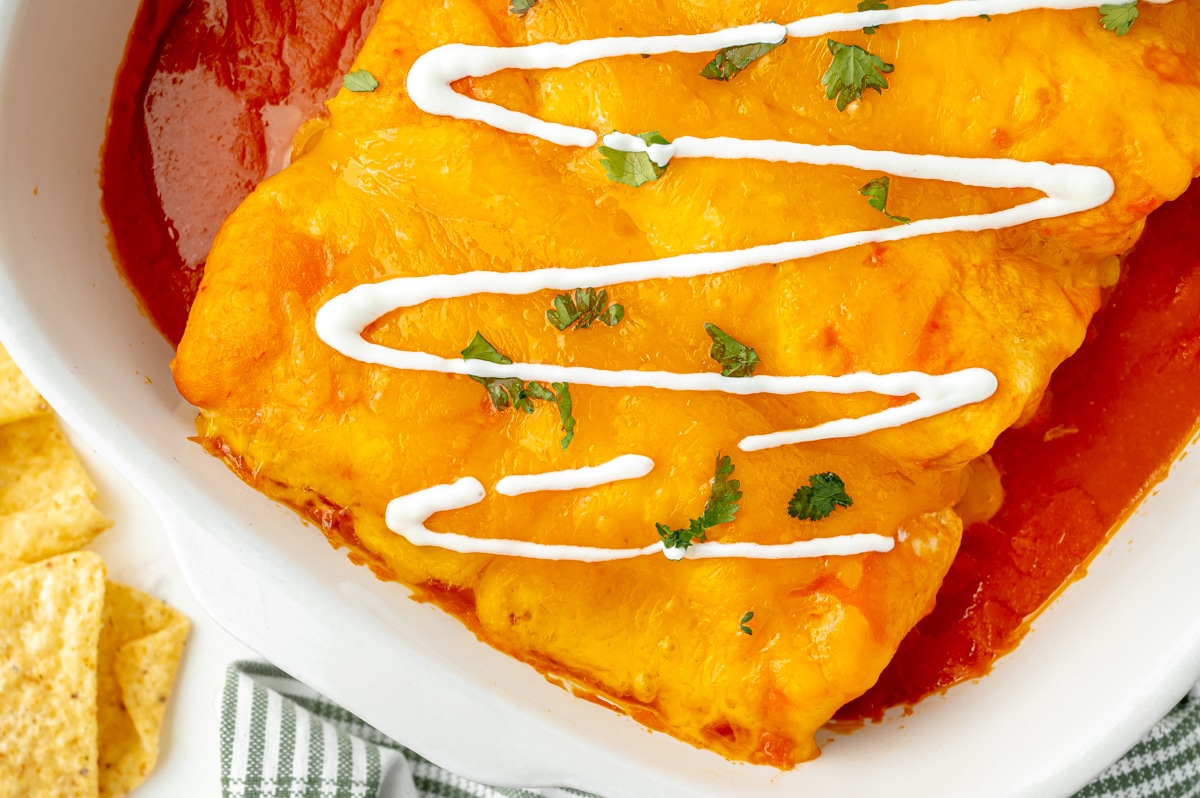 close up of casserole dish of enchiladas