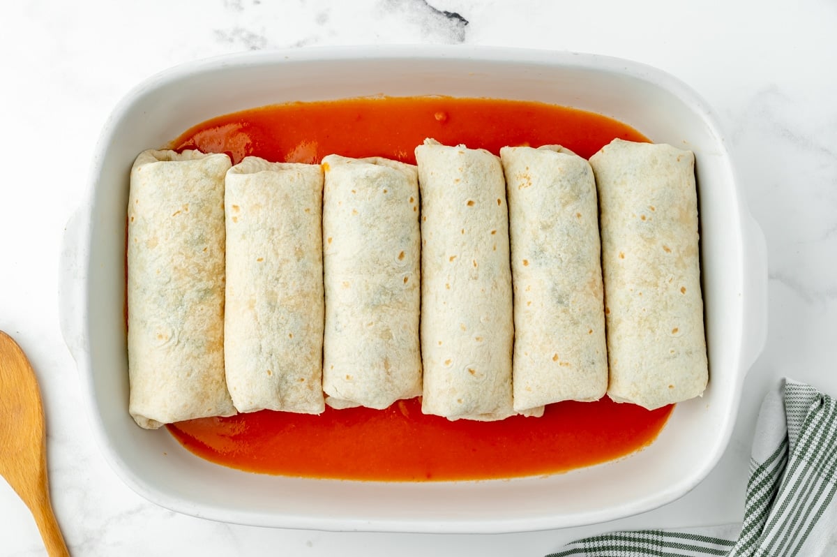 rolled tortillas in baking dish