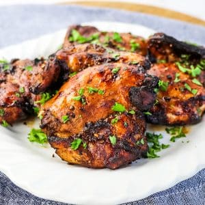 chicken thighs in air fryer on plate