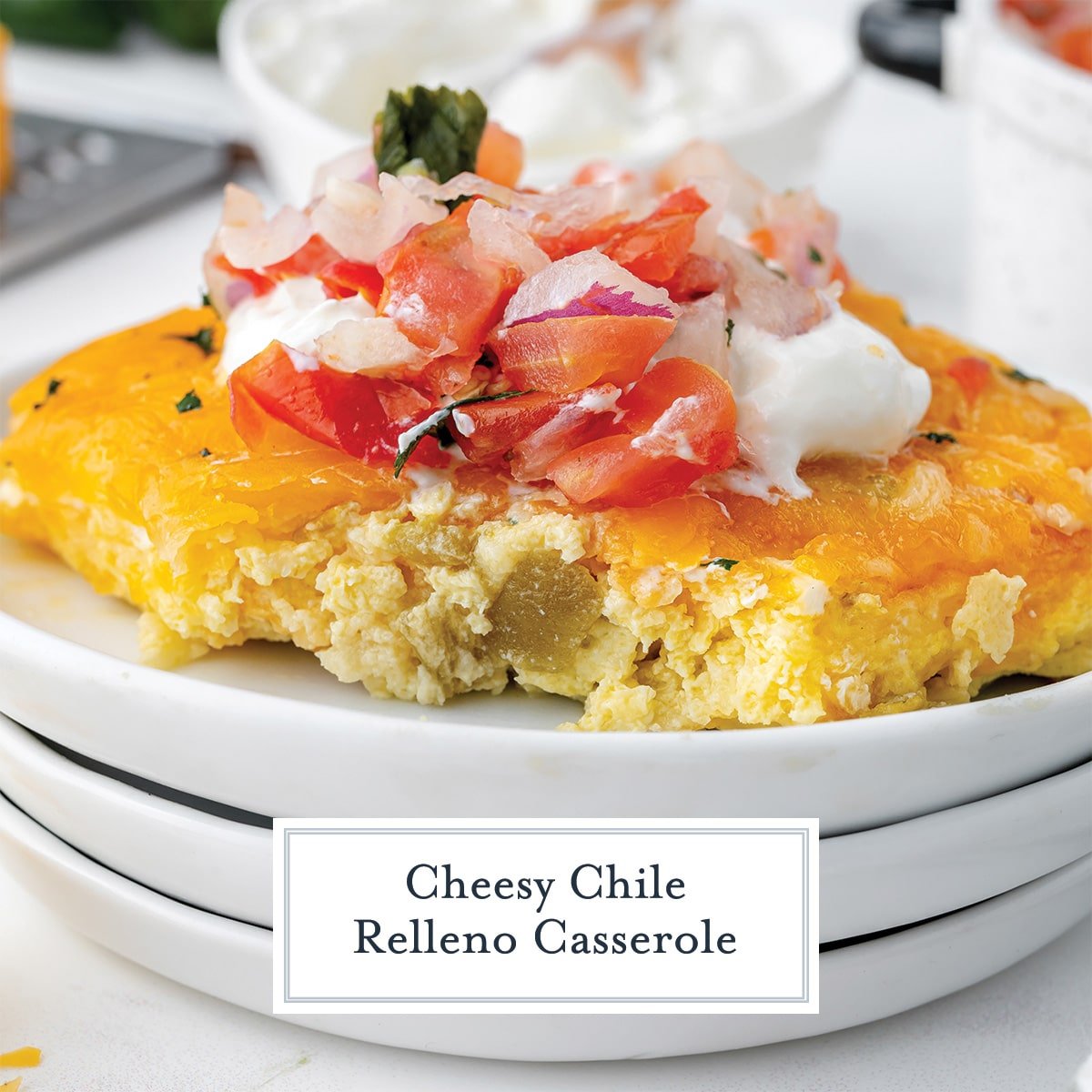 slice of chile relleno casserole on white plates