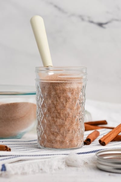 glass spice jar with a spoon