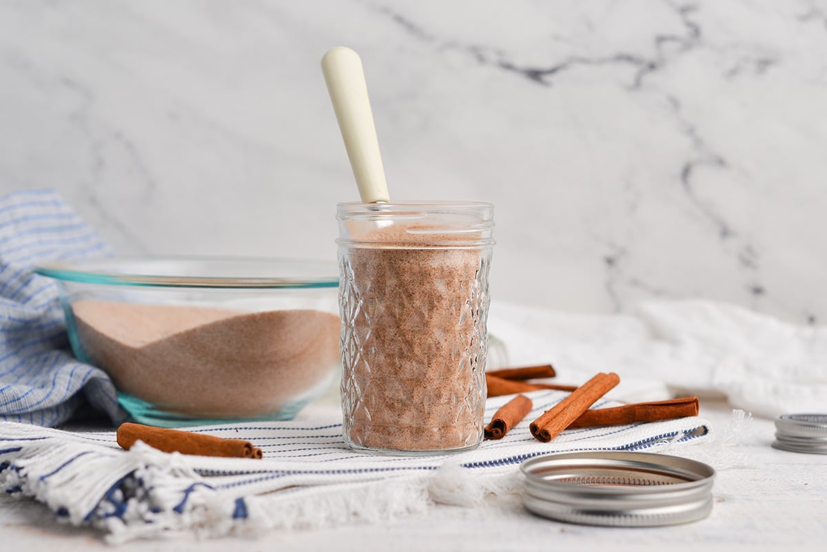 glass spice jar with a spoon