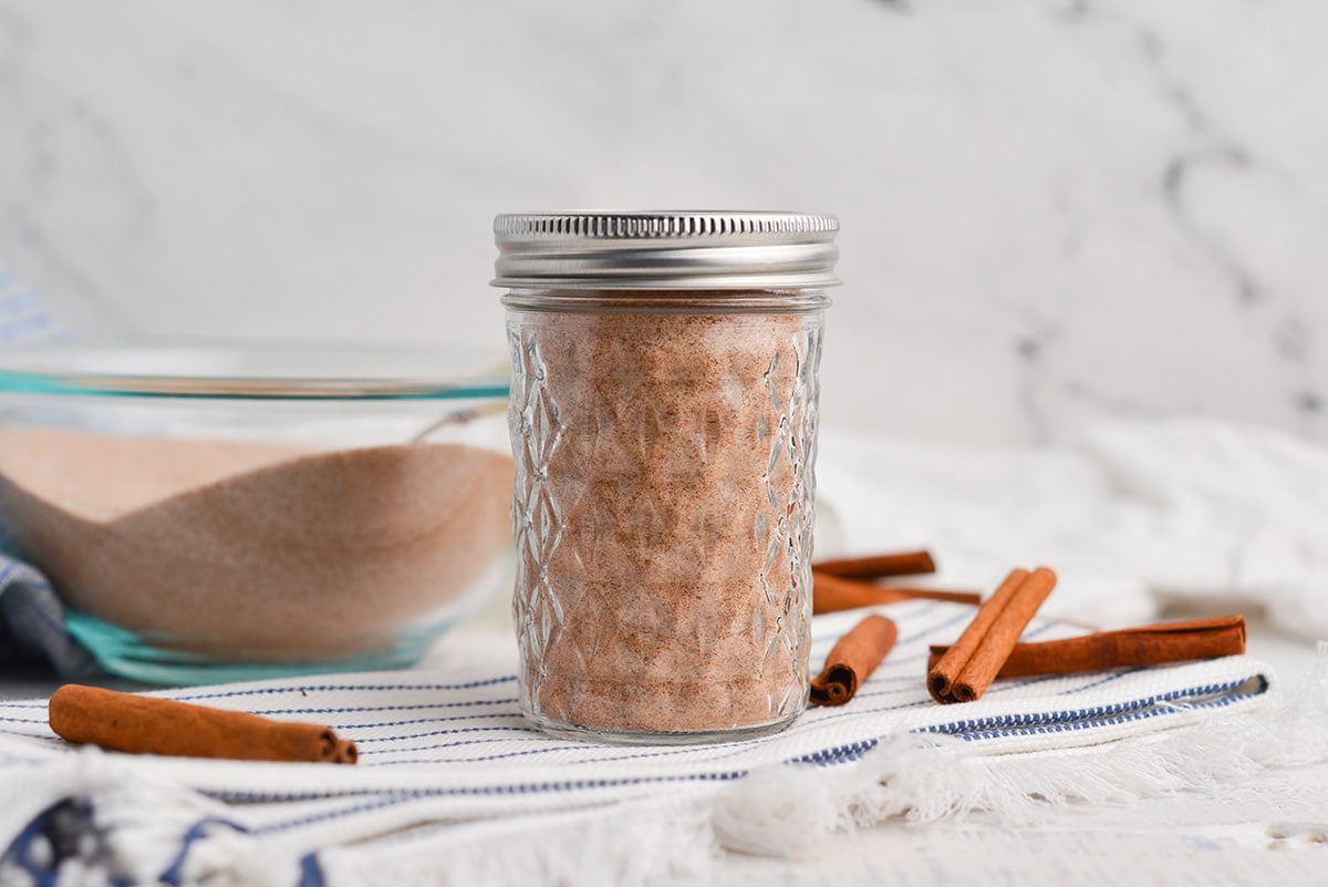 glass jar with metal top for cinnamon sugr spice blend