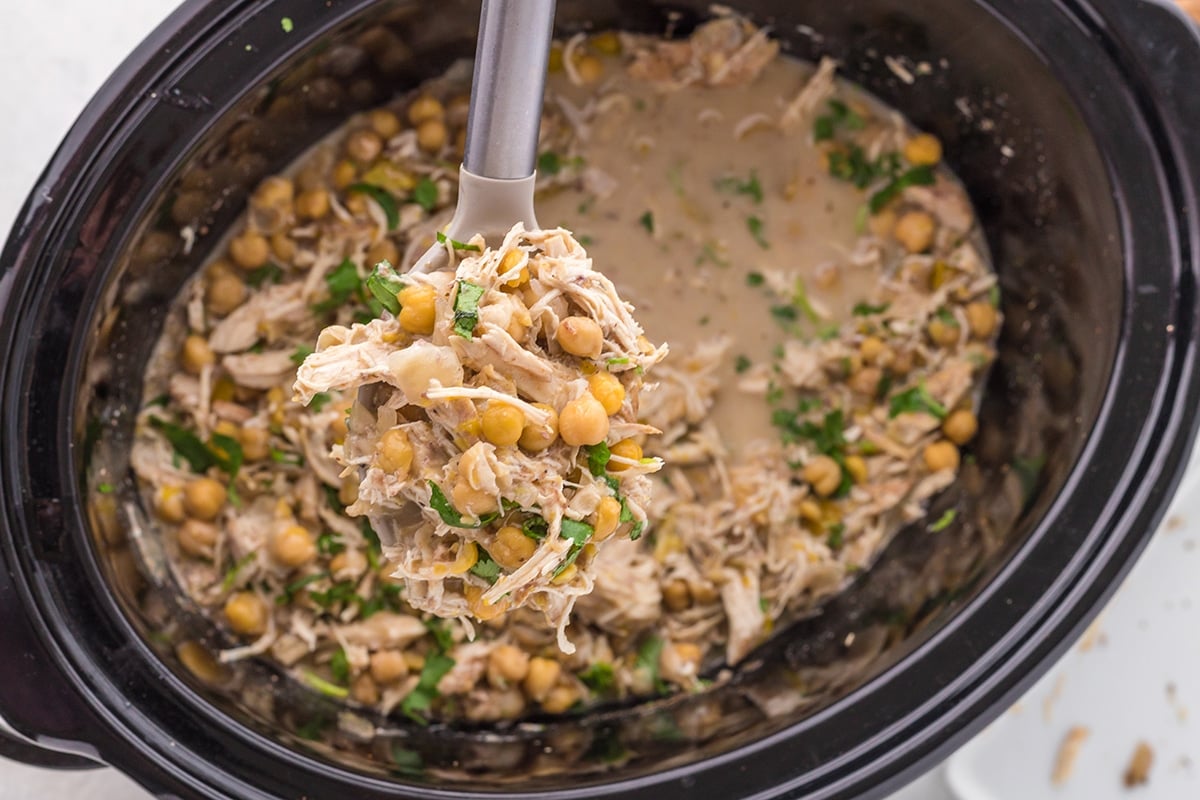 ladle in slow cooker of white chicken chili