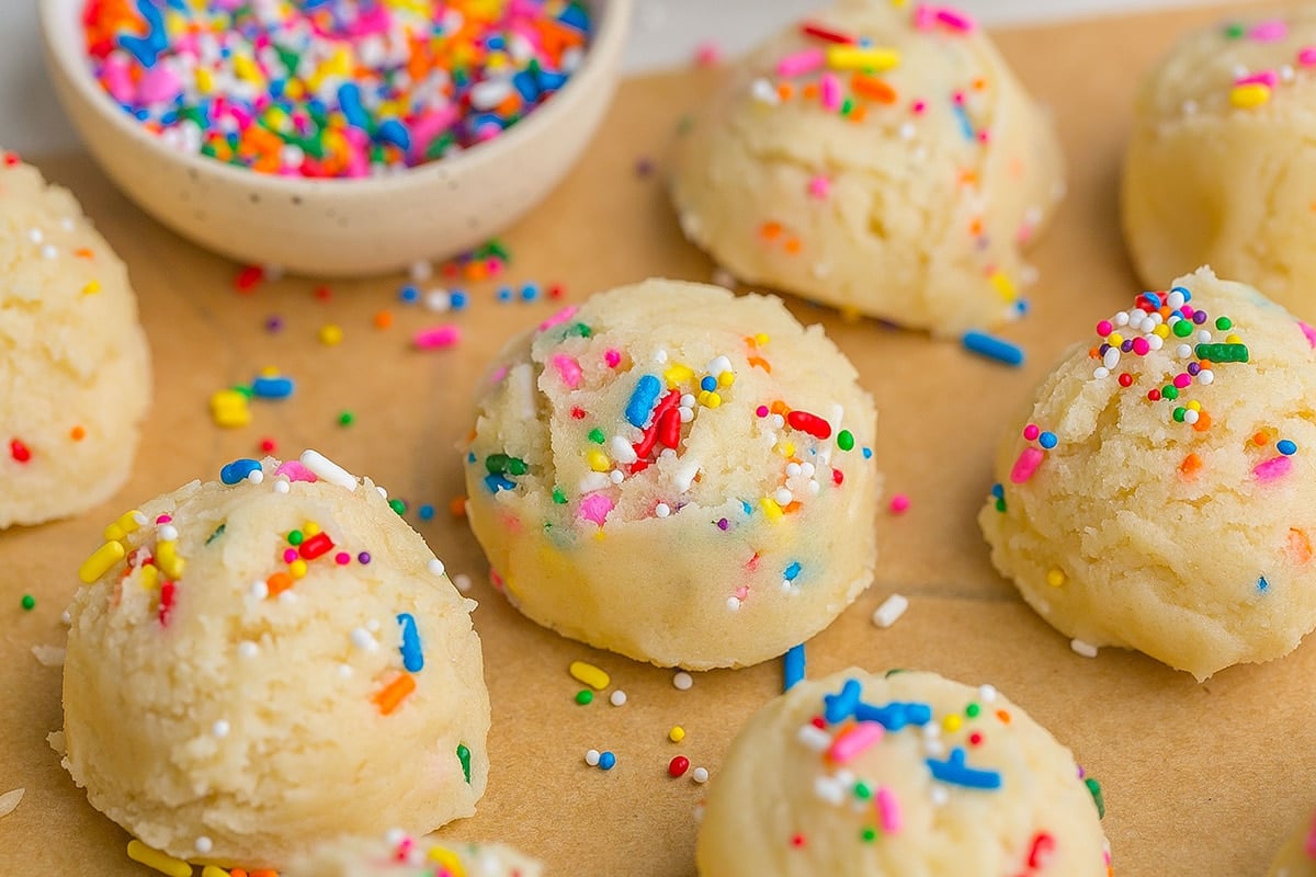 scoops of dough on parchment paper