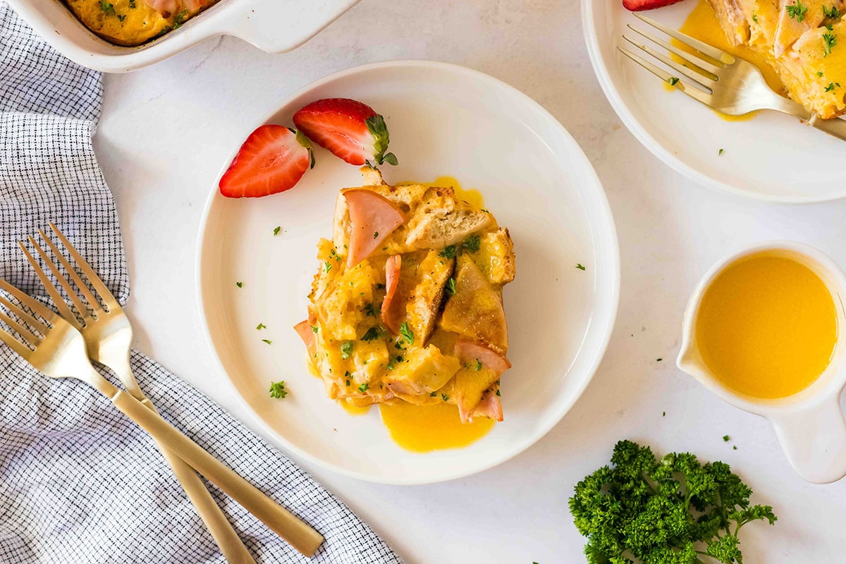 overhead shot of eggs benedict casserole on a plate