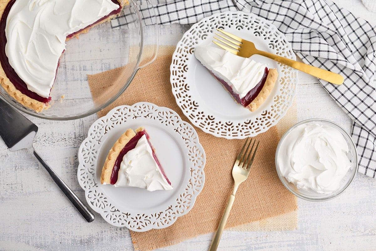 overhead shot of slices of pie on plates