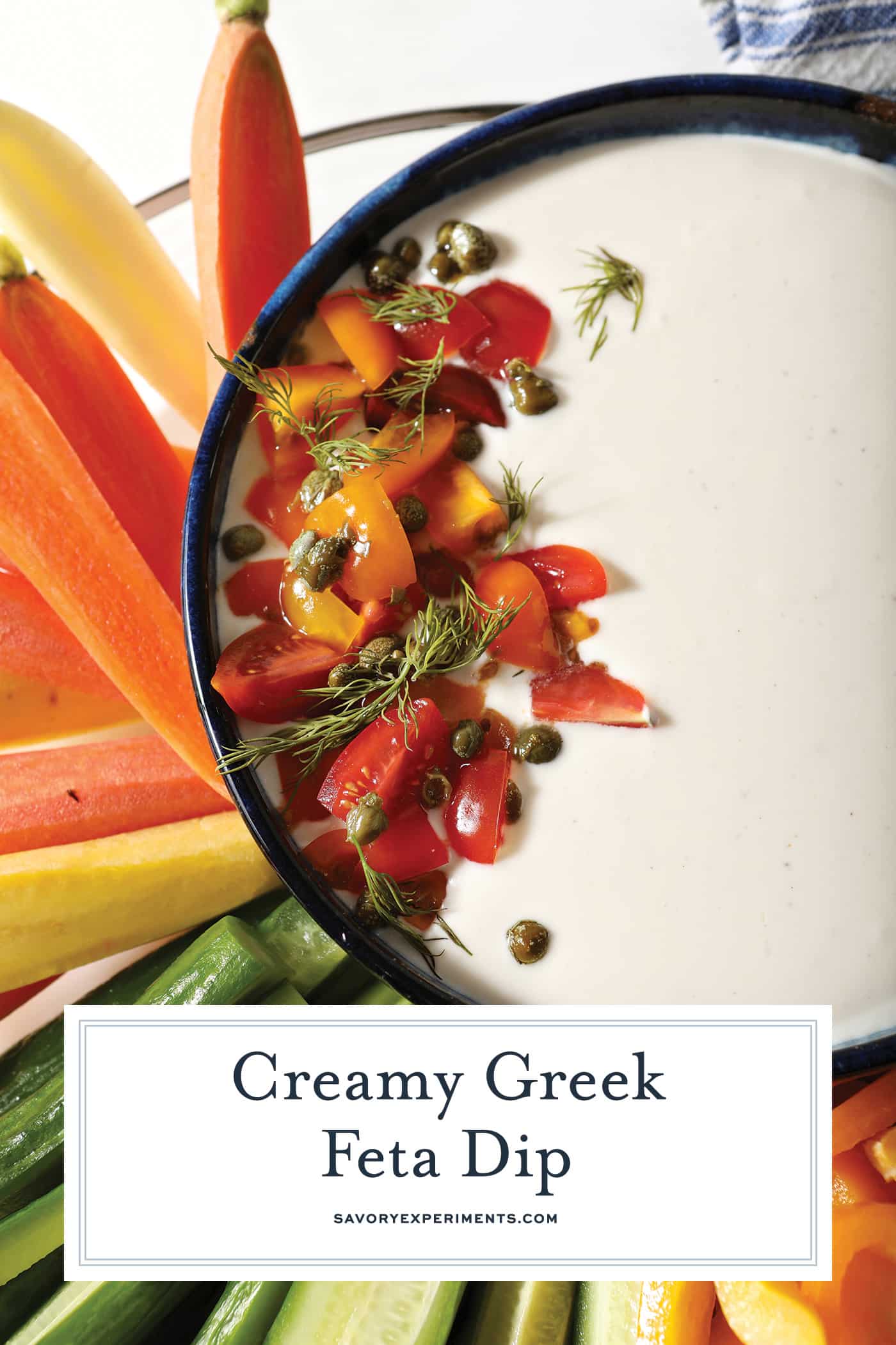 half shot of bowl of greek feta dip with text overlay for pinterest