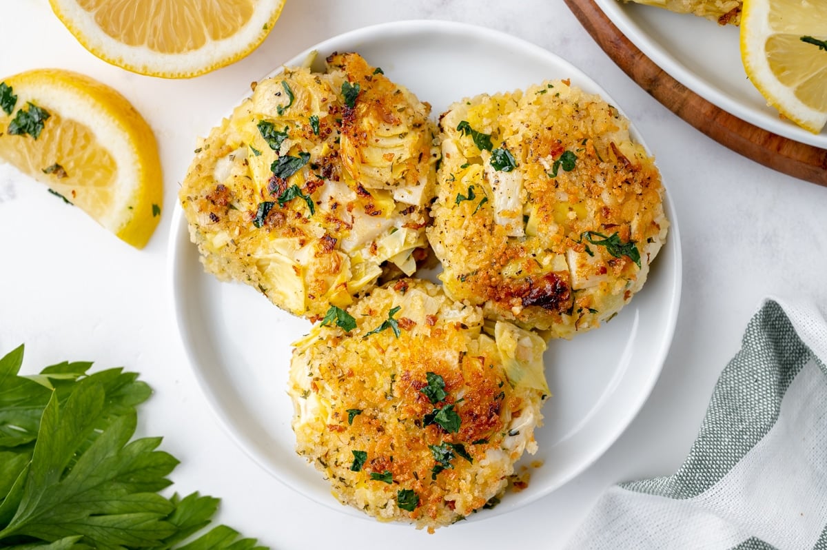 three hearts of palm cakes on a plate