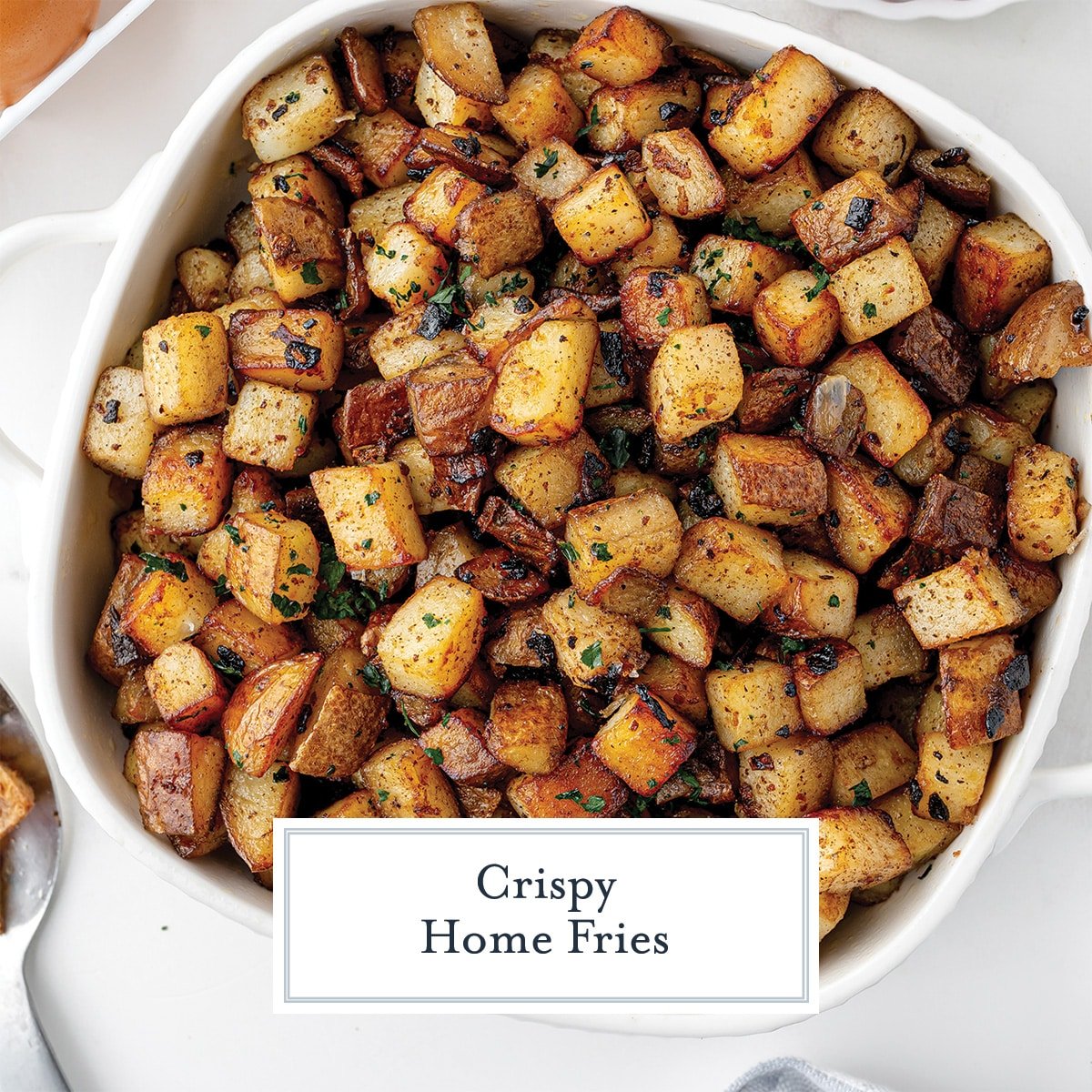 overhead home fries in a white serving bowl