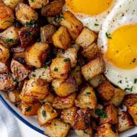fried potatoes with fried eggs