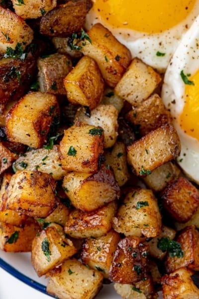 fried potatoes with fried eggs