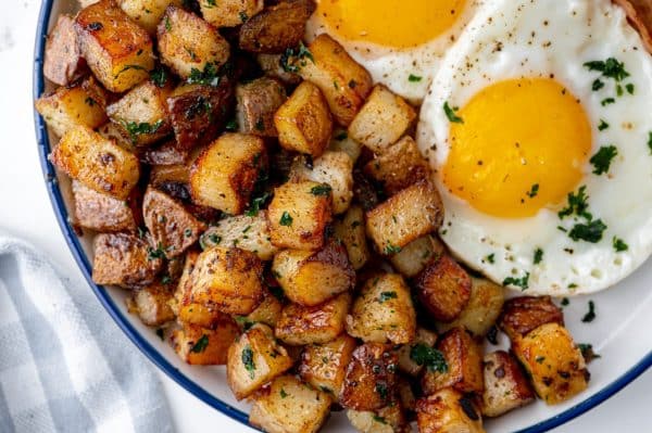 fried potatoes with fried eggs
