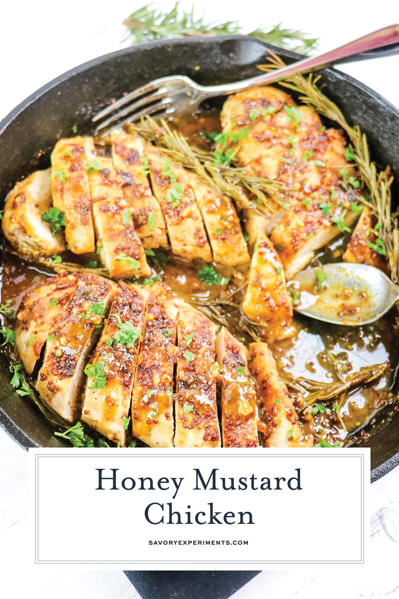 sliced honey mustard chicken in skillet with text overlay for pinterest