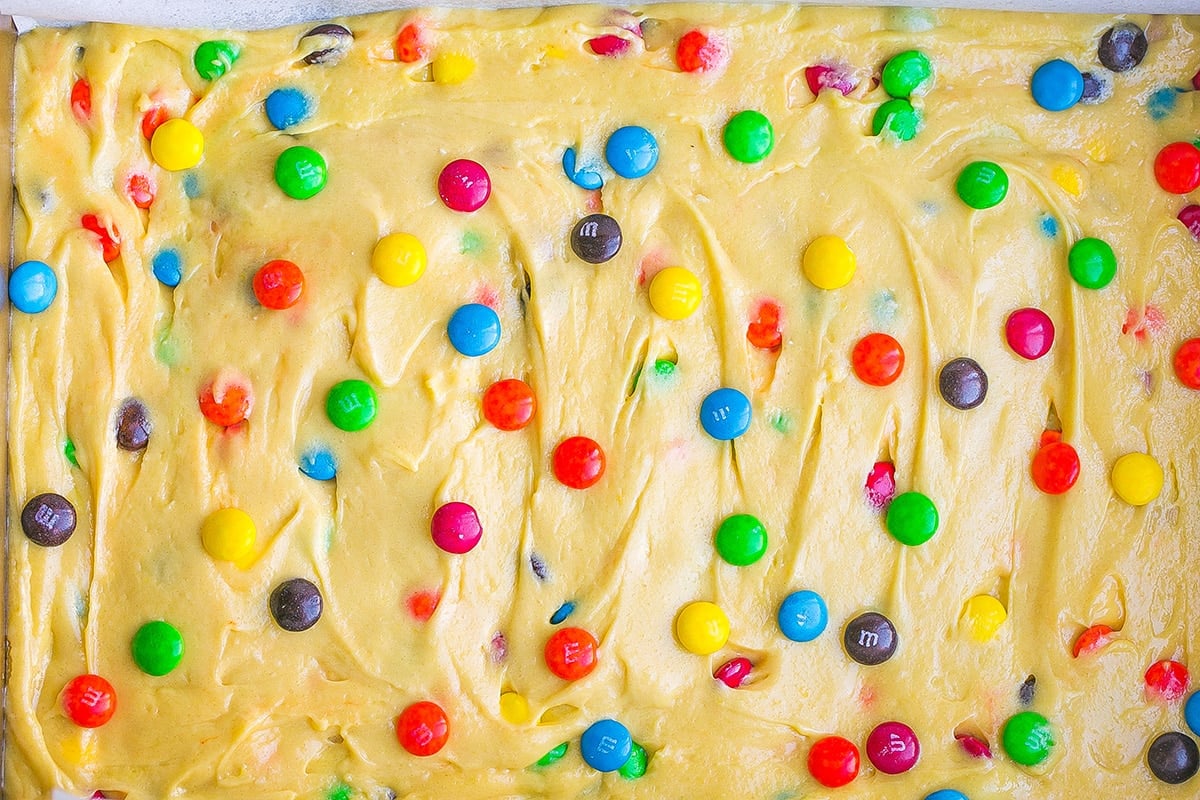m&ms placed on cookie dough