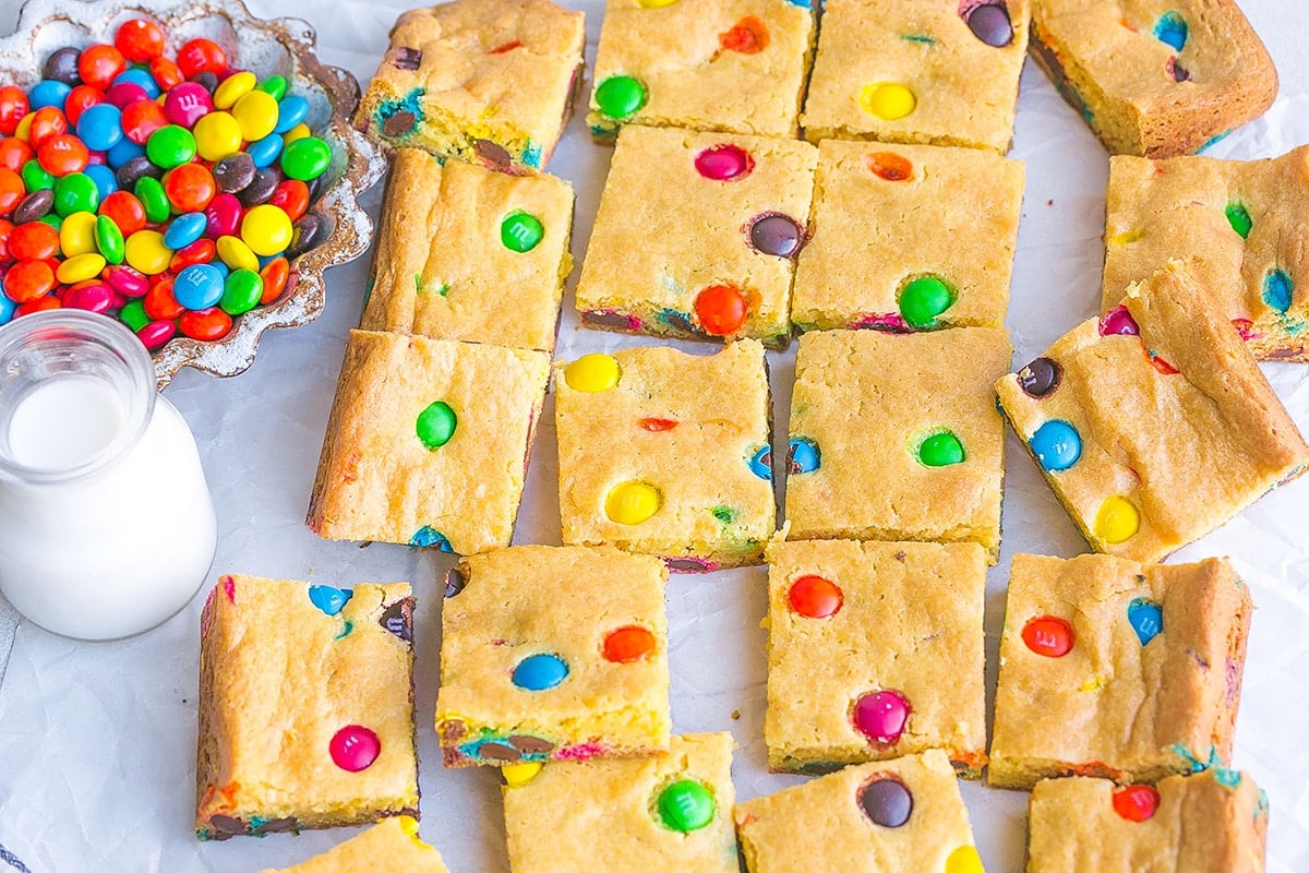 cookie bars cut on parchment paper