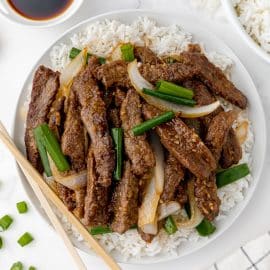 overhead shot of mongolian beef on a plate