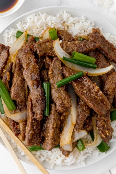 overhead shot of mongolian beef on a plate