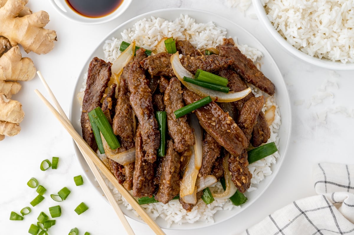 overhead shot of mongolian beef on a plate