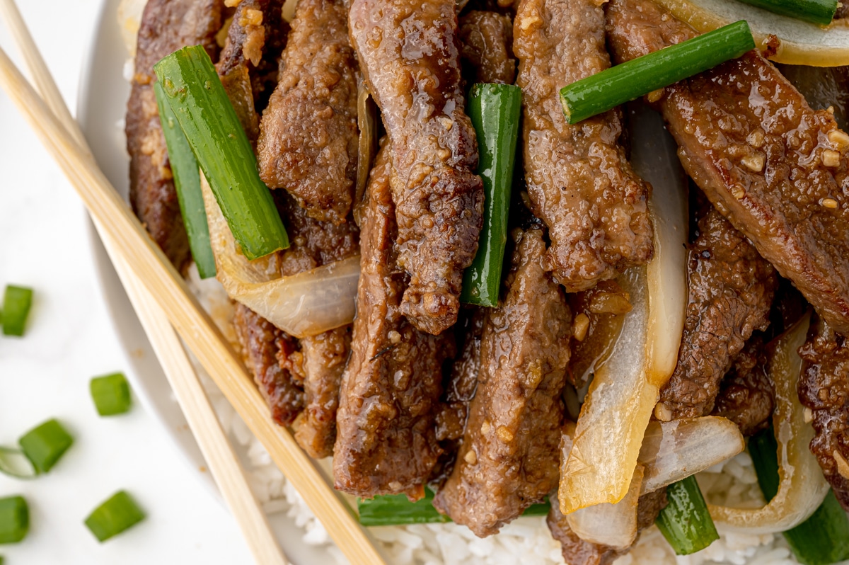 close up overhead shot of mongolian beef on a plate