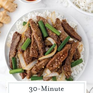 overhead shot of mongolian beef on a plate with text overlay for pinterest