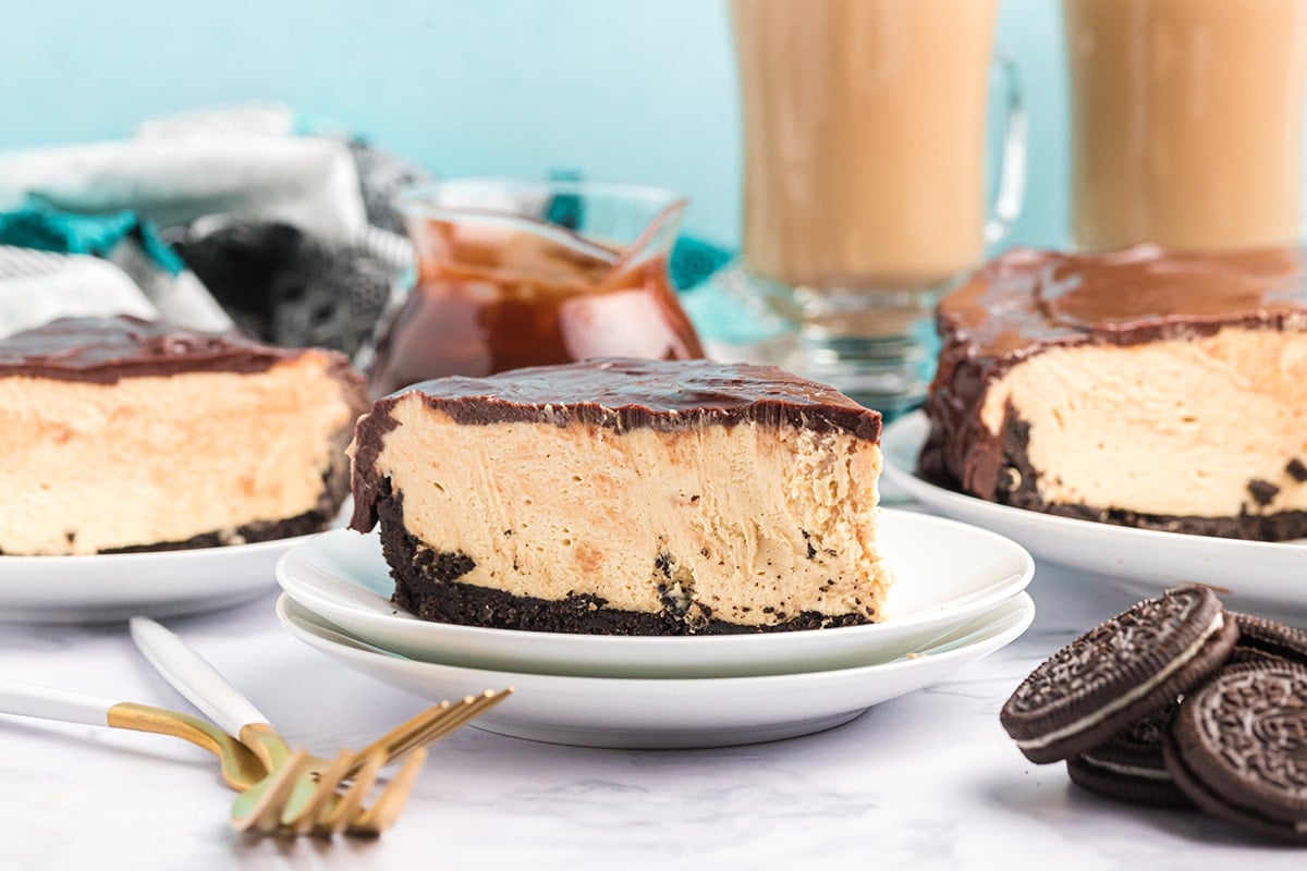 straight on shot of slice of no bake peanut butter cheesecake on plate