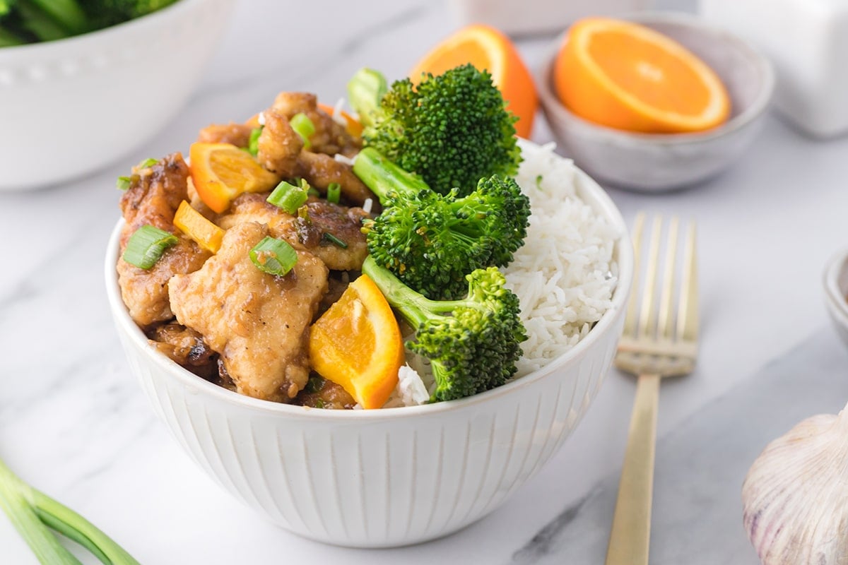orange chicken with broccoli and rice