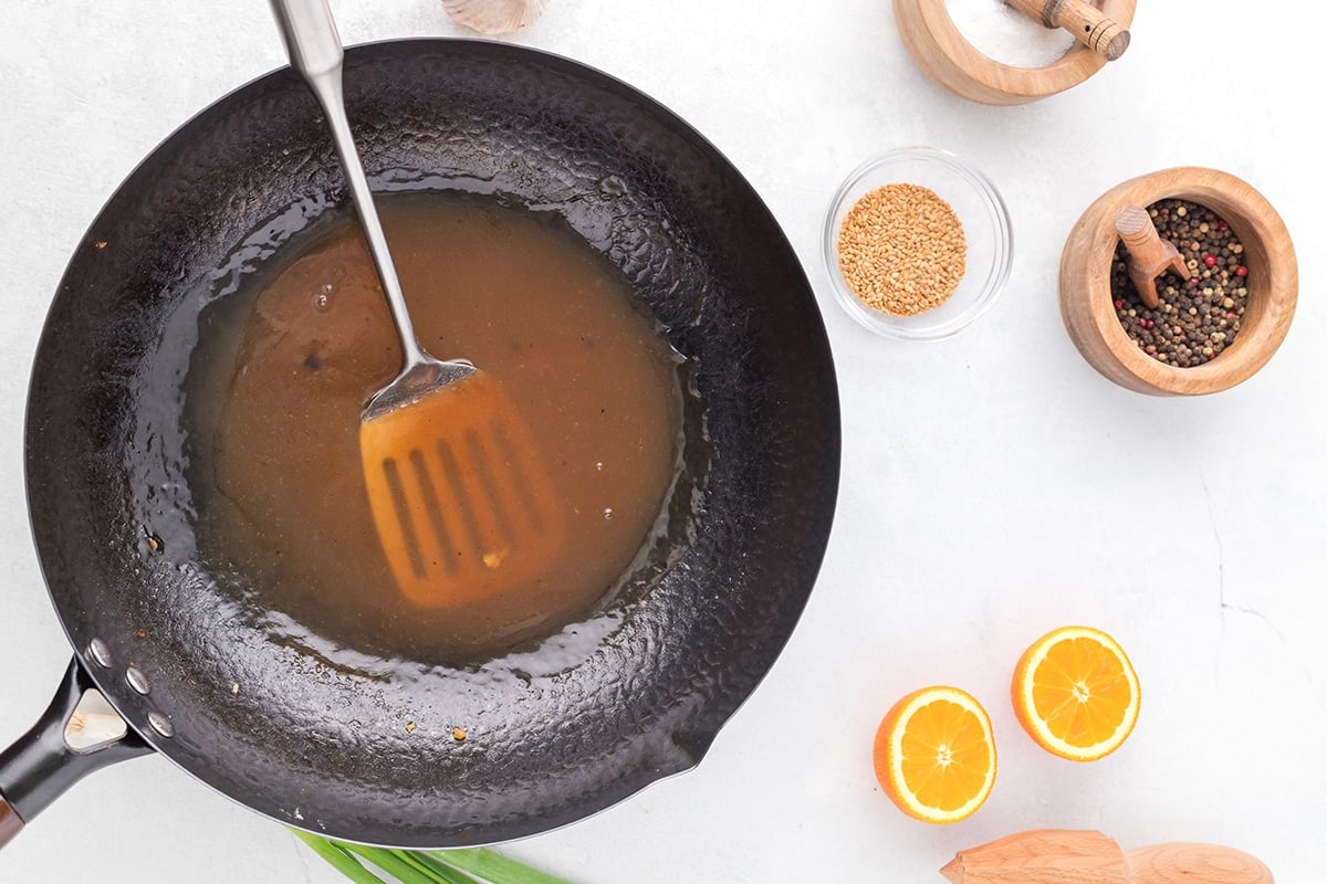 orange chicken sauce in pan