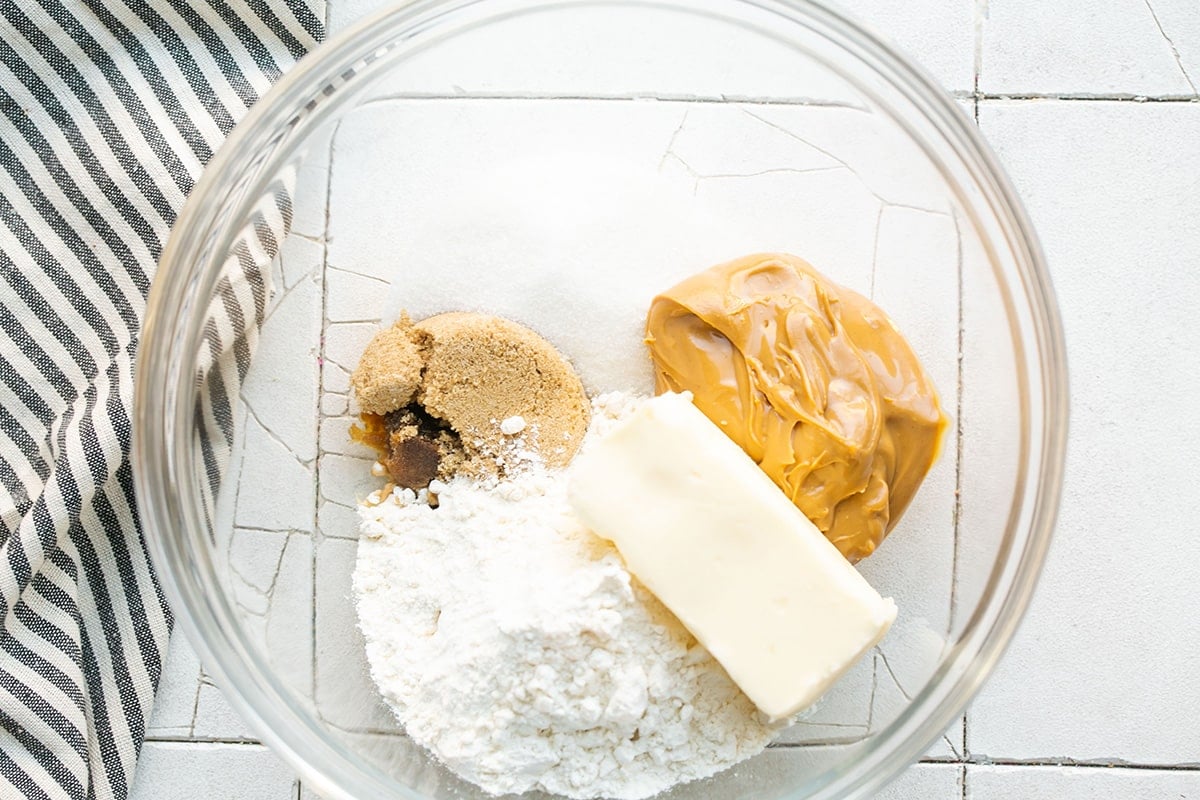 peanut butter cookie dough ingredients in a bowl