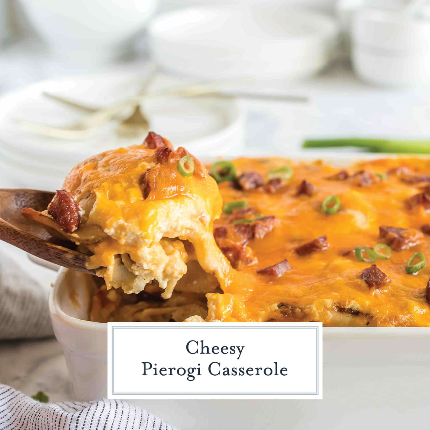 spoon scooping out cheesy casserole with text overlay for facebook
