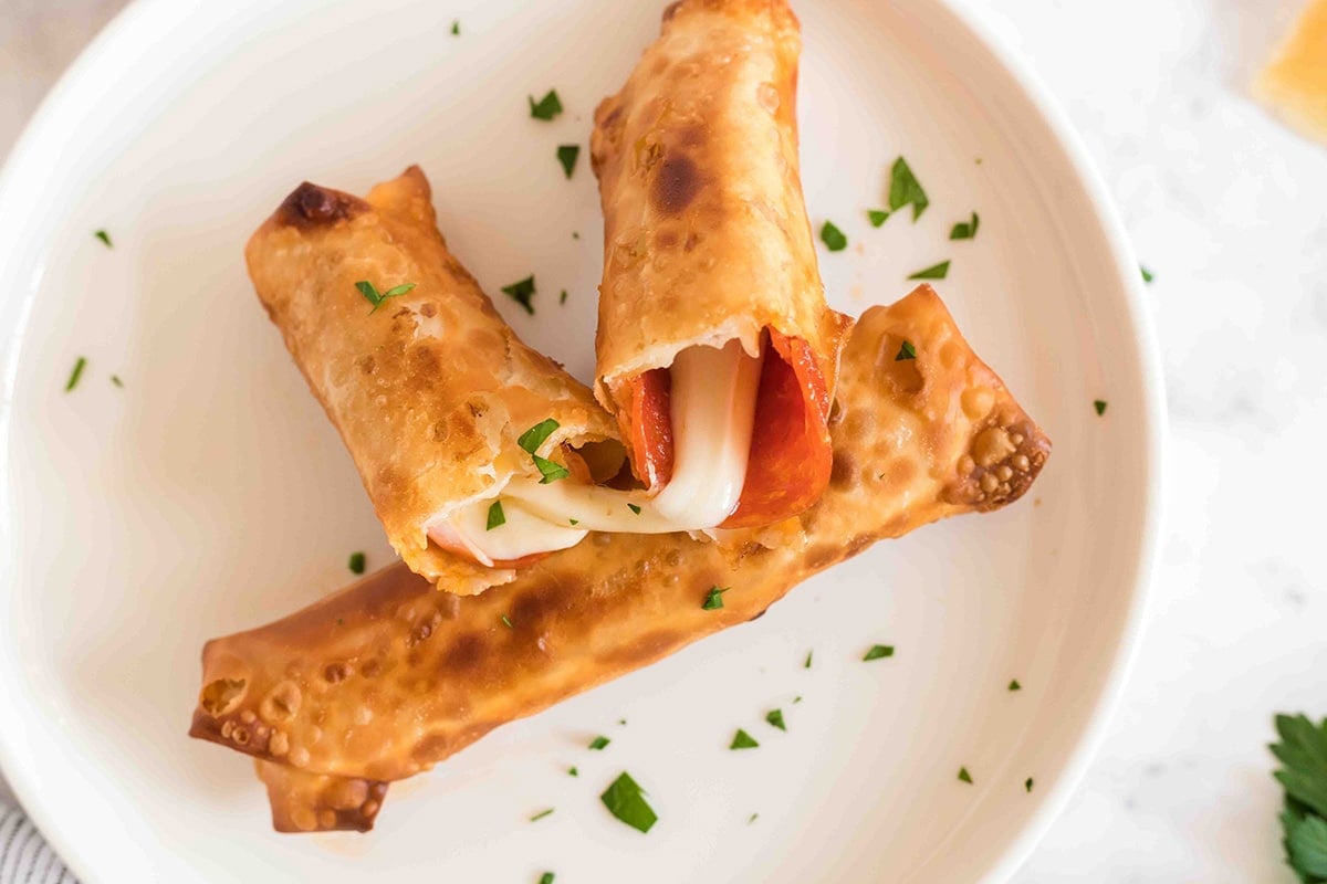 overhead shot of pizza roll cut in half