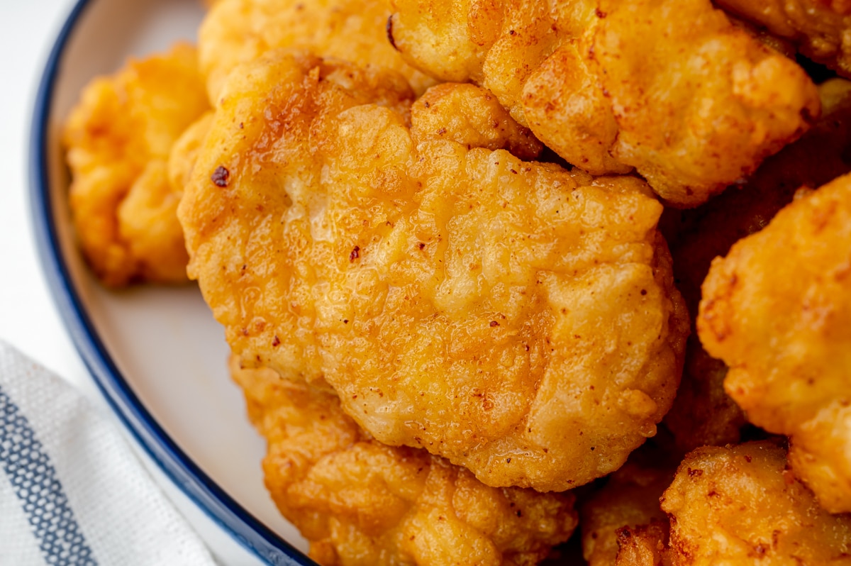 close up of piece of popcorn chicken