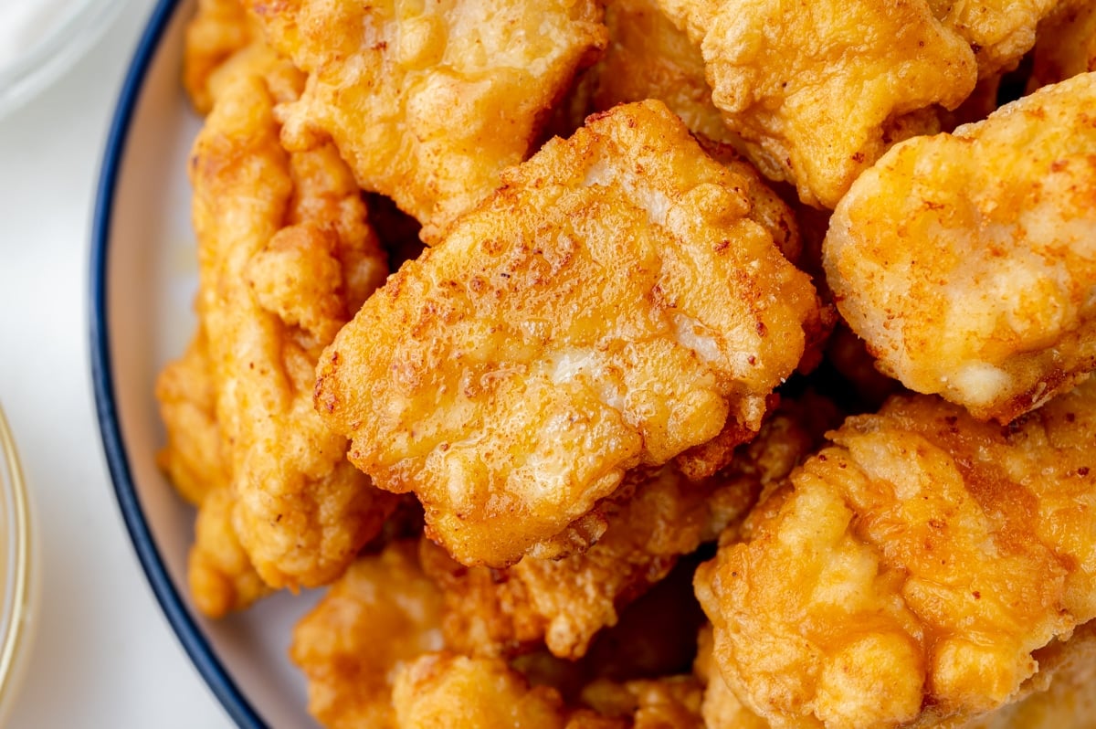 close up of popcorn chicken in a bowl