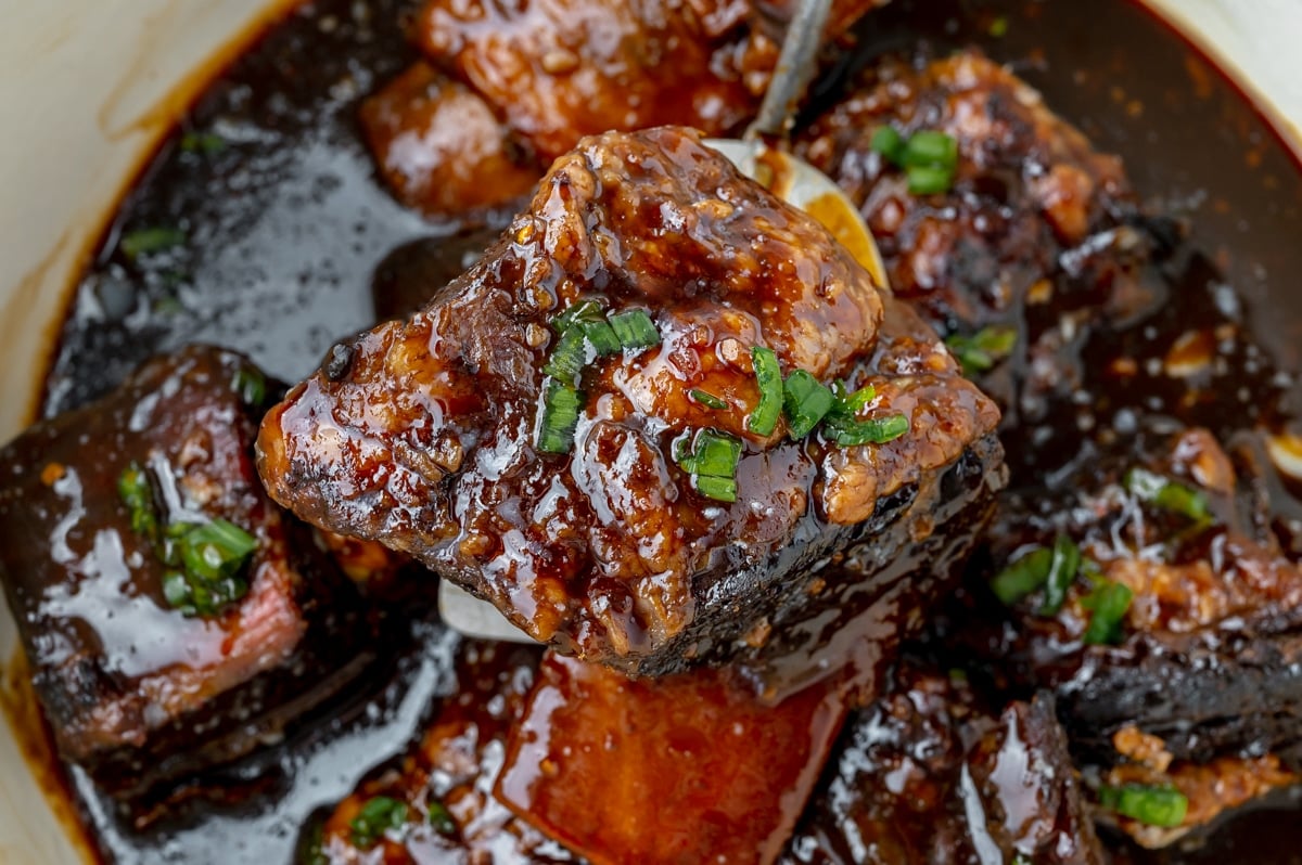 honey ginger short rib on a serving spoon