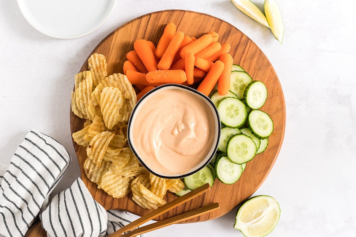 overhead shot of platter of veggies with sriracha aioli