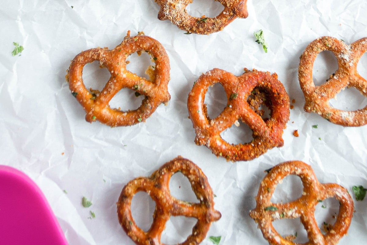 close up of spicy ranch pretzels on paper
