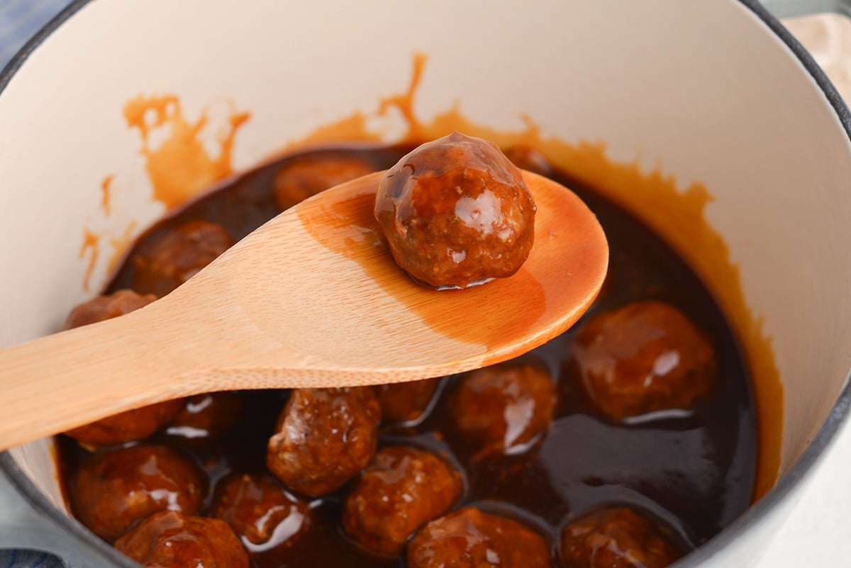 teriyaki meatball on wooden spoon