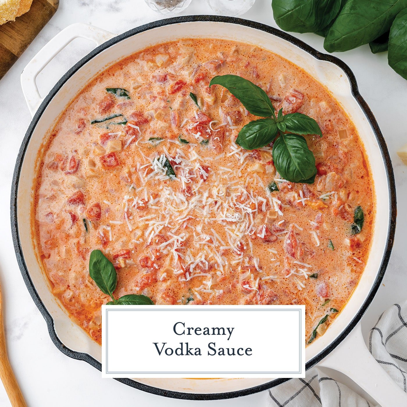 creamy vodka sauce in a pan with text overlay for facebook