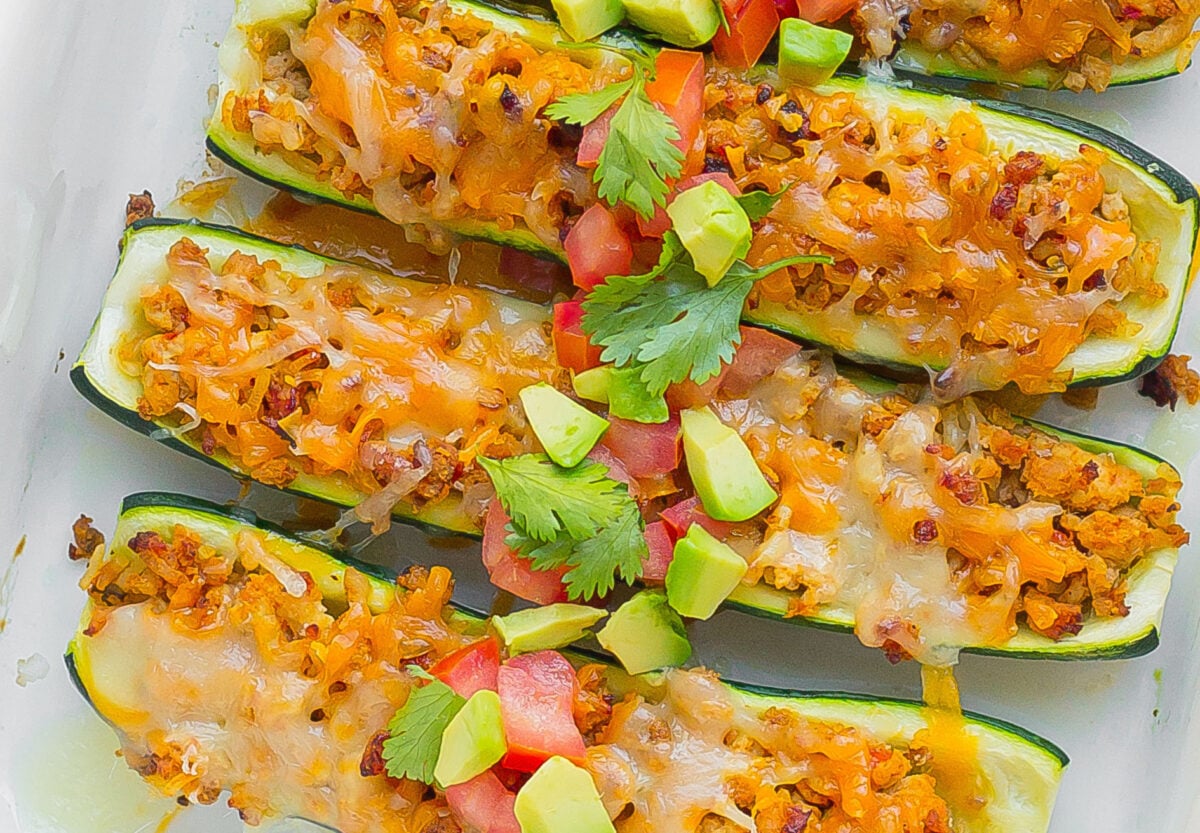 overhead close up of zucchini stuffed with beef taco meats