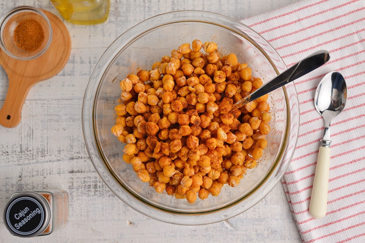 air fryer chickpeas in bowl with seasoning