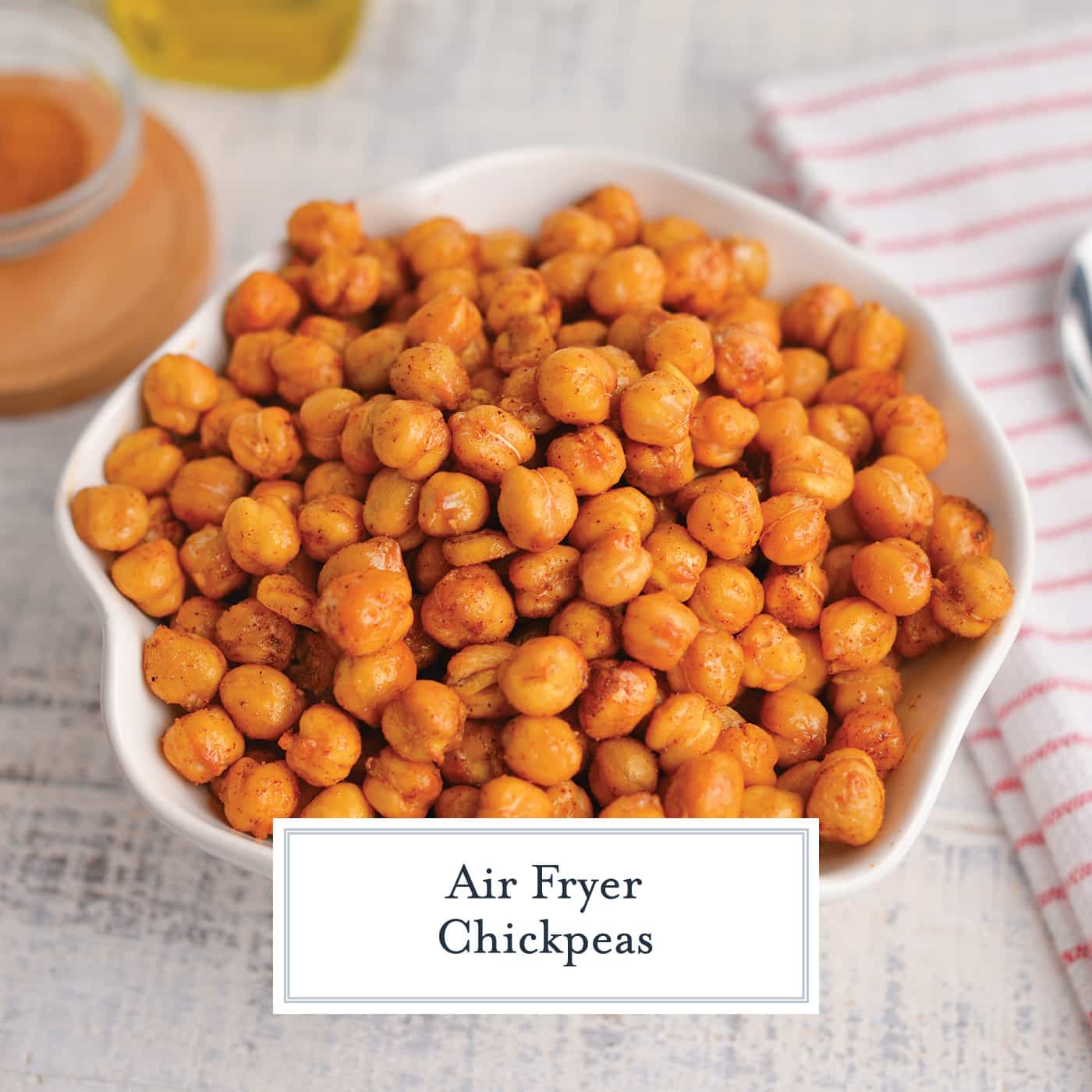 angled shot of bowl of crispy chickpeas with text overlay for facebook